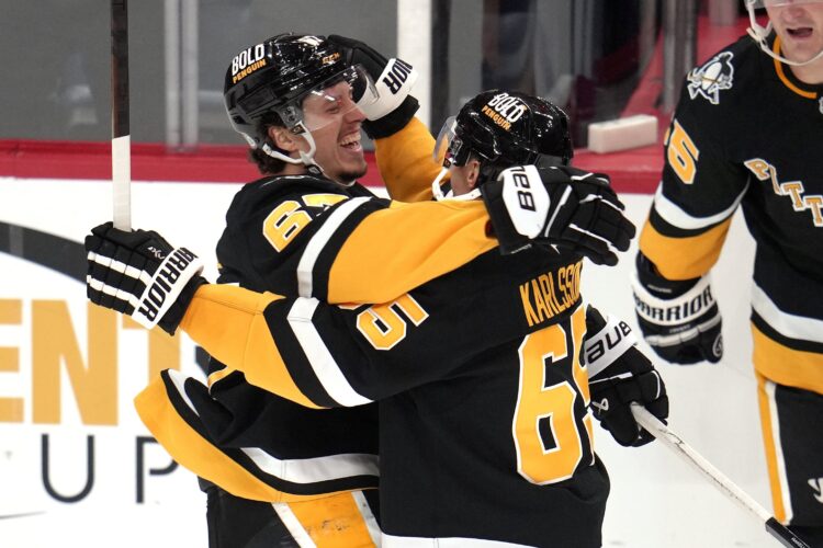 Rakell’s goal in overtime pushes Penguins past Kings